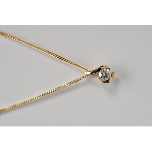 92 - A 9CT GOLD DIAMOND PENDANT, from Goldsmiths Canadian Ice Diamond Collection, the brilliant cut diamo... 