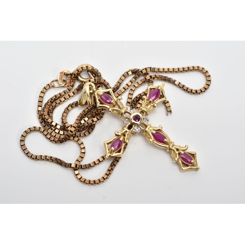 97 - A 9CT GOLD RUBY AND DIAMOND PENDANT AND CHAIN, the cross pendant set with five marquise shape rubies... 