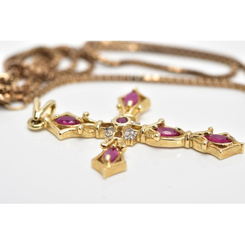 97 - A 9CT GOLD RUBY AND DIAMOND PENDANT AND CHAIN, the cross pendant set with five marquise shape rubies... 