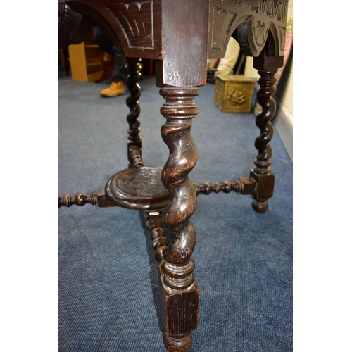 45A - A 1920'S CIRCULAR CARVED OAK CENTRE TABLE, on angled barley twist legs united by bobbin turned stret... 