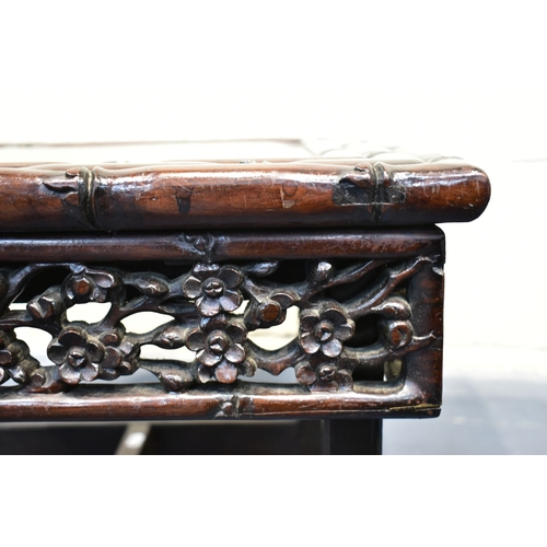 50A - A CHINESE CARVED HARDWOOD OCCASIONAL TABLE, carved faux bamboo top surmounting a frieze of carved pr... 