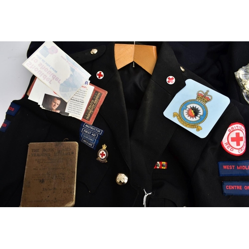 104 - A BOX CONTAINING ITEMS OF A BRITISH RED CROSS INTEREST, two British Red Cross uniform jackets with i... 