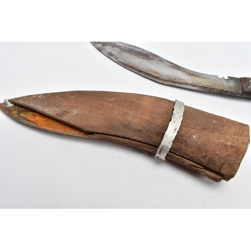 109 - TWO MIDDLE EASTERN? ASIAN KUKRI STYLE DAGGERS with scabbards, poor condition, one with metal scabbar... 