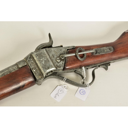 114 - THREE WHITE METAL COPIES OF ANTIQUE FIREARMS, the first is a copy of a Miquelet flintlock pistol hav... 