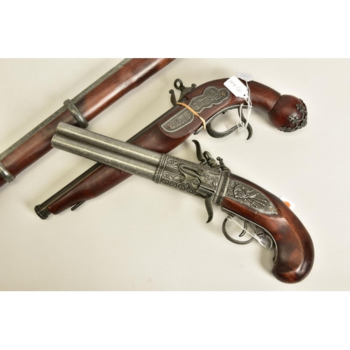 114 - THREE WHITE METAL COPIES OF ANTIQUE FIREARMS, the first is a copy of a Miquelet flintlock pistol hav... 