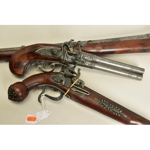 114 - THREE WHITE METAL COPIES OF ANTIQUE FIREARMS, the first is a copy of a Miquelet flintlock pistol hav... 