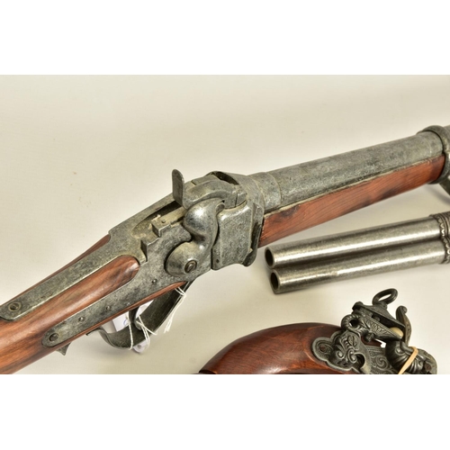 114 - THREE WHITE METAL COPIES OF ANTIQUE FIREARMS, the first is a copy of a Miquelet flintlock pistol hav... 