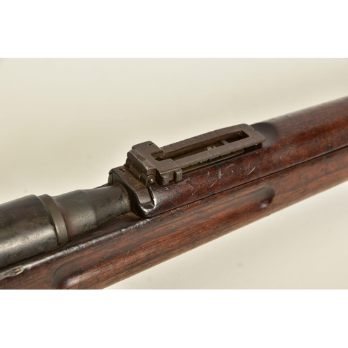 115 - A STEYR MANNLICHER MODEL 95 MILITARY RIFLE CONVERTED TO .410'', the magazine had a plate welded acro... 