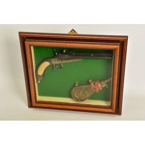 129 - A NEATLY FRAMED DISPLAY CASE containing a cast metal replica of a Collette Gravity pistol, together ... 