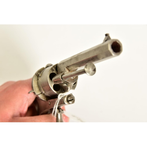 130 - A 7MM PIN-FIRE POCKET REVOLVER fitted with a folding trigger, it is fitted with a two piece set of w... 