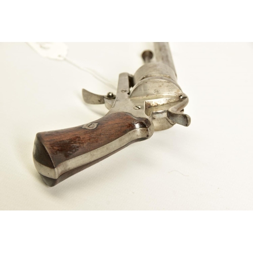 130 - A 7MM PIN-FIRE POCKET REVOLVER fitted with a folding trigger, it is fitted with a two piece set of w... 
