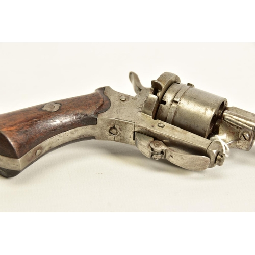 130 - A 7MM PIN-FIRE POCKET REVOLVER fitted with a folding trigger, it is fitted with a two piece set of w... 