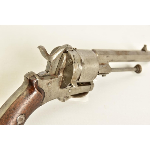 130 - A 7MM PIN-FIRE POCKET REVOLVER fitted with a folding trigger, it is fitted with a two piece set of w... 