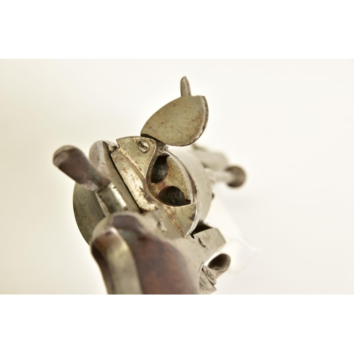 130 - A 7MM PIN-FIRE POCKET REVOLVER fitted with a folding trigger, it is fitted with a two piece set of w... 