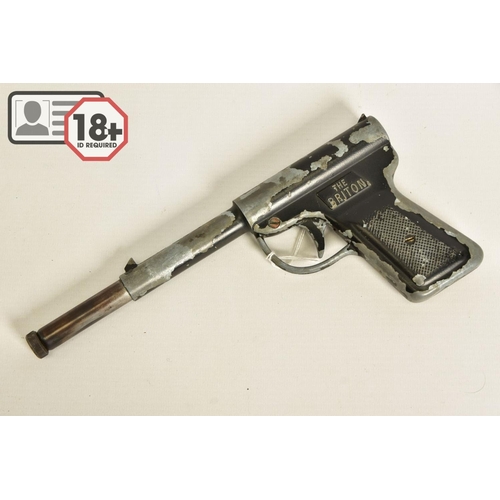 134 - A .177'' GAT TYPE AIR PISTOL marked Briton, it's japanned surfaces have lost a considerable amount o... 