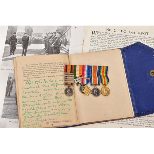43 - AN ARCHIVE OF MINIATURE MEDALS AND ORIGINAL PAPERWORK ATTRIBUTED TO A SOLDIER IN THE 'QUEENS' ROYAL ... 