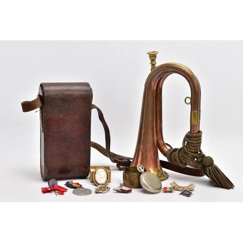 63 - ARMY STYLE BUGLE, copper and brass with attached mouthpiece and green corded knot, together with a b... 