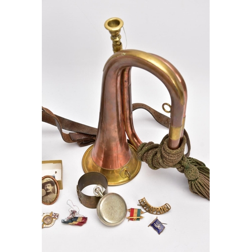 63 - ARMY STYLE BUGLE, copper and brass with attached mouthpiece and green corded knot, together with a b... 