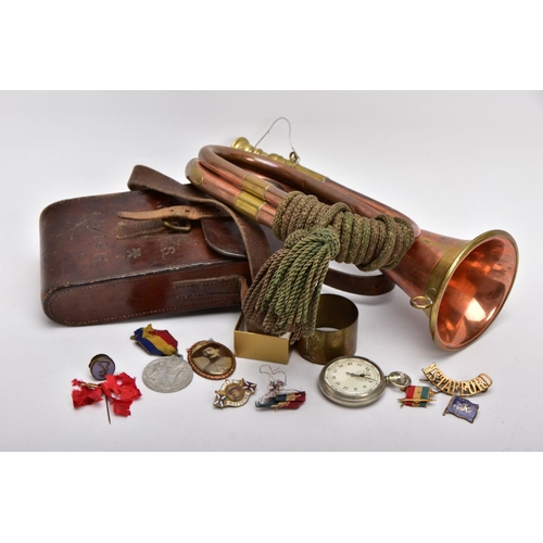 63 - ARMY STYLE BUGLE, copper and brass with attached mouthpiece and green corded knot, together with a b... 