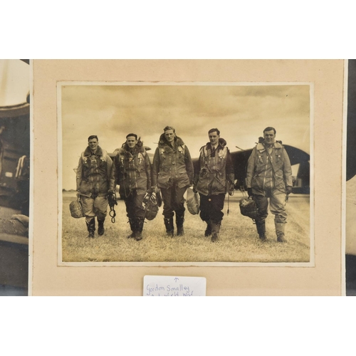 64 - A GLAZED FRAME CONTAINING THREE BLACK AND WHITE PHOTOS OF RAF WWII AIRCREW, one of the Airman featur... 