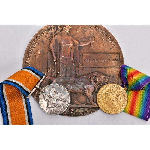 72 - A WWI MEMORIAL DEATH PLAQUE named George Haynes, together with a British War and Victory medal named... 