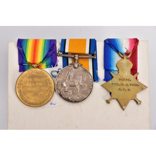 80 - A WWI 1914-15 STAR TRIO OF MEDALS named to 90249 FTR (Fitter) H.J.Wood. RFA. Cpl on Pair