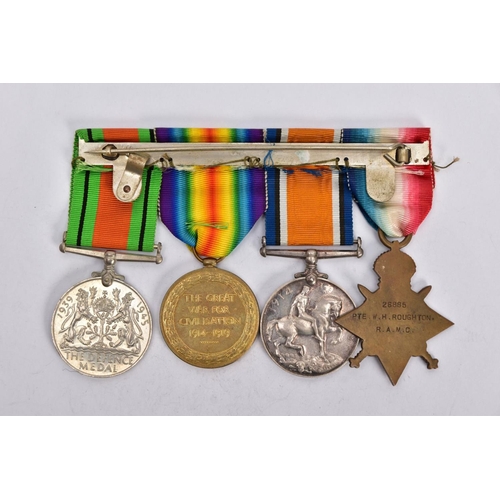 84 - A WEARING BAR GROUP OF WWI/II MEDALS to include a 1914-15 Star/British War and Victory medal named t... 