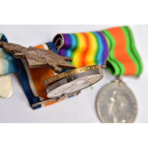 84 - A WEARING BAR GROUP OF WWI/II MEDALS to include a 1914-15 Star/British War and Victory medal named t... 