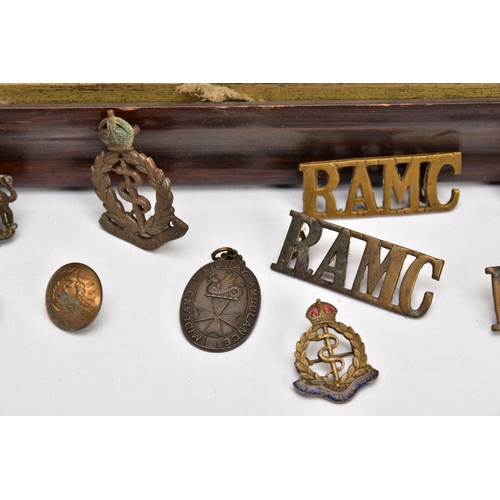 91 - A LARGE GLAZED FRAME WITH A WWI PERIOD PHOTO OF A COMPANY OF SOLDIERS, in uniform, believed RAMC, to... 