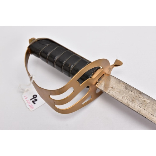 92 - A LOW QUALITY SWORD AND SCABBARD, blade is curved and approximately 80cm in length, the blade is sli... 