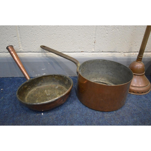 1384 - SIX VARIOUS PIECES OF COPPER, to include a large heavy pan with an iron handle, another pan, two war... 