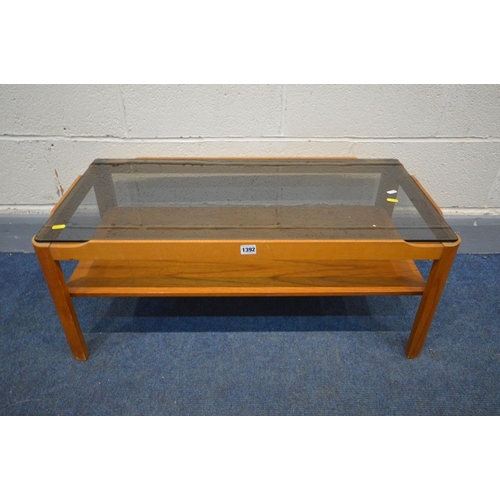 1392 - A MYER TEAK AND SMOKED GLASS TOPPED COFFEE TABLE, width 88cm x depth 44cm x height 35cm