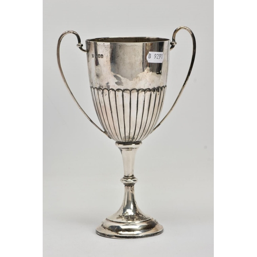 20 - A SILVER TROPHY CUP, double scroll handles, stop reeding design to half of the cup, tapered stem, on... 