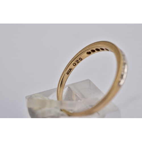 23 - TWO 9CT GOLD DIAMOND RINGS, the first of a half eternity design, set with a row of graduated channel... 