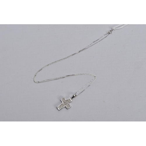 24 - A 9CT WHITE GOLD DIAMOND SET PENDANT NECKLACE, the pendant in the form of a cross, set with single c... 