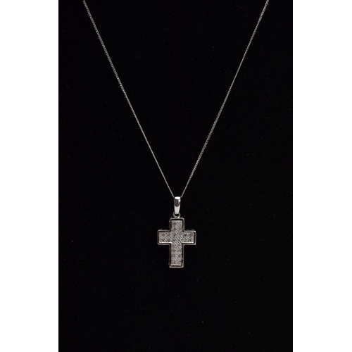 24 - A 9CT WHITE GOLD DIAMOND SET PENDANT NECKLACE, the pendant in the form of a cross, set with single c... 