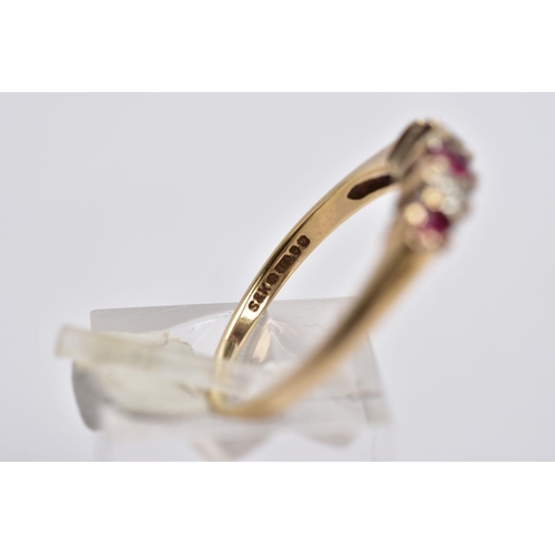 25 - A 9CT GOLD RUBY AND DIAMOND RING, designed with three graduated circular cut rubies, interspaced wit... 