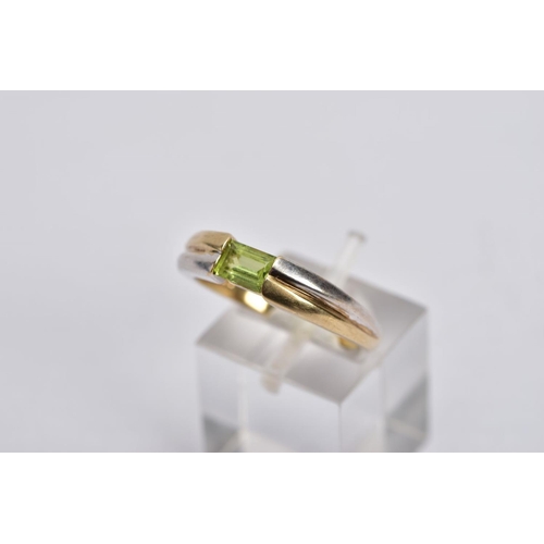 34 - A 9CT GOLD DIAMOND RING AND A 9CT GOLD PERIDOT RING, the first ring designed with a raised illusion ... 