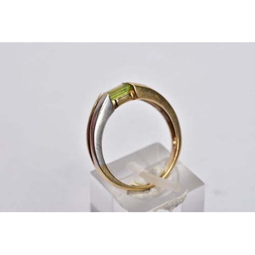 34 - A 9CT GOLD DIAMOND RING AND A 9CT GOLD PERIDOT RING, the first ring designed with a raised illusion ... 