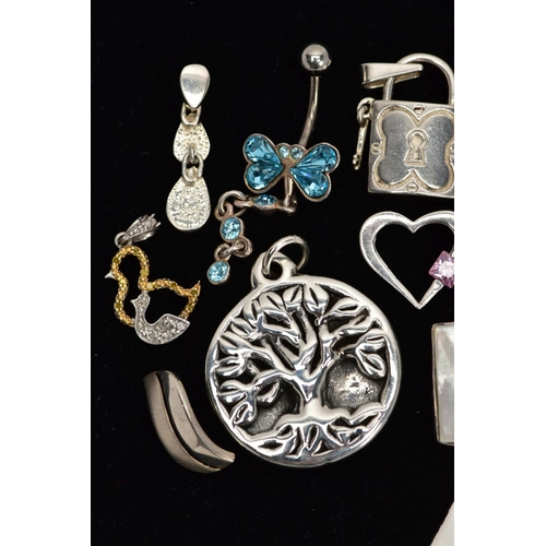 4 - A BOX OF ASSORTED WHITE METAL PENDANTS AND A BELLY BUTTON BAR, in various forms such as a white meta... 