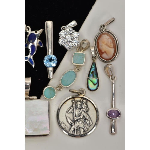 4 - A BOX OF ASSORTED WHITE METAL PENDANTS AND A BELLY BUTTON BAR, in various forms such as a white meta... 