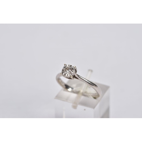 49 - TWO DIAMOND RINGS, the first a white gold ring, designed with a raised illusion set, round brilliant... 