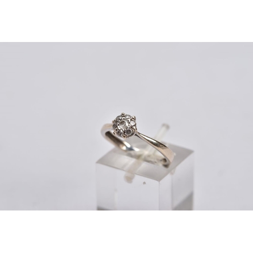 49 - TWO DIAMOND RINGS, the first a white gold ring, designed with a raised illusion set, round brilliant... 