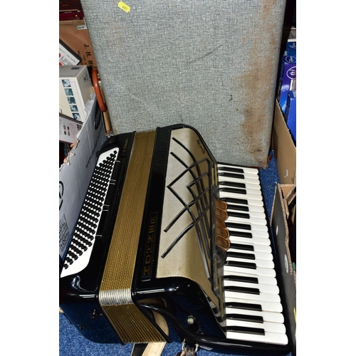 495 - A CASED HOHNER VIRTUOLA III 'PIANO ACCORDION', in black finish with 120 bass and 5 treble couplers a... 