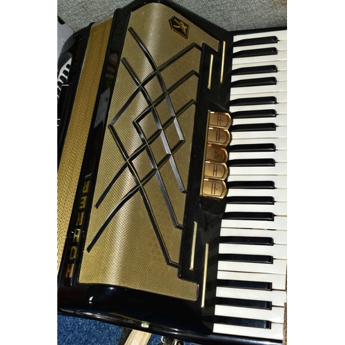 495 - A CASED HOHNER VIRTUOLA III 'PIANO ACCORDION', in black finish with 120 bass and 5 treble couplers a... 