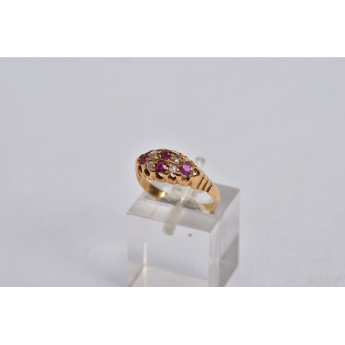 50 - A VICTORIAN DIAMOND AND RUBY BOAT RING, set with four circular cut rubies, interspaced with four ros... 