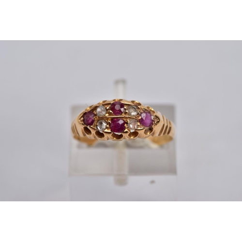 50 - A VICTORIAN DIAMOND AND RUBY BOAT RING, set with four circular cut rubies, interspaced with four ros... 