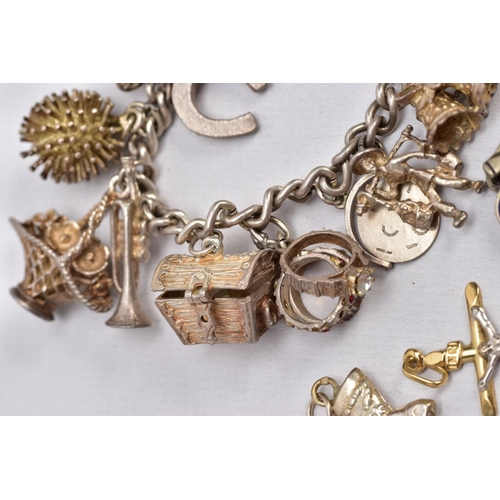 59 - A SILVER CHARM BRACELET, LOOSE CHARMS AND TWO WHITE METAL CHAINS, the charm bracelet fitted with a h... 