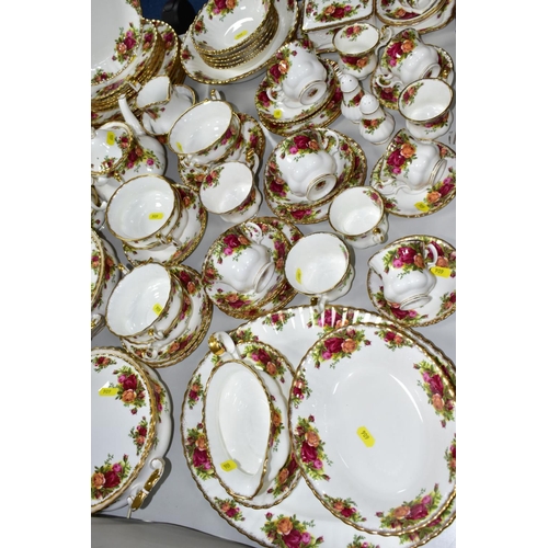 606 - ROYAL ALBERT 'OLD COUNTRY ROSES' comprising two cake plates, two tureens, oval meat platter, gravy b... 