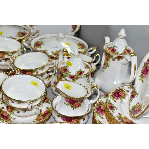 606 - ROYAL ALBERT 'OLD COUNTRY ROSES' comprising two cake plates, two tureens, oval meat platter, gravy b... 